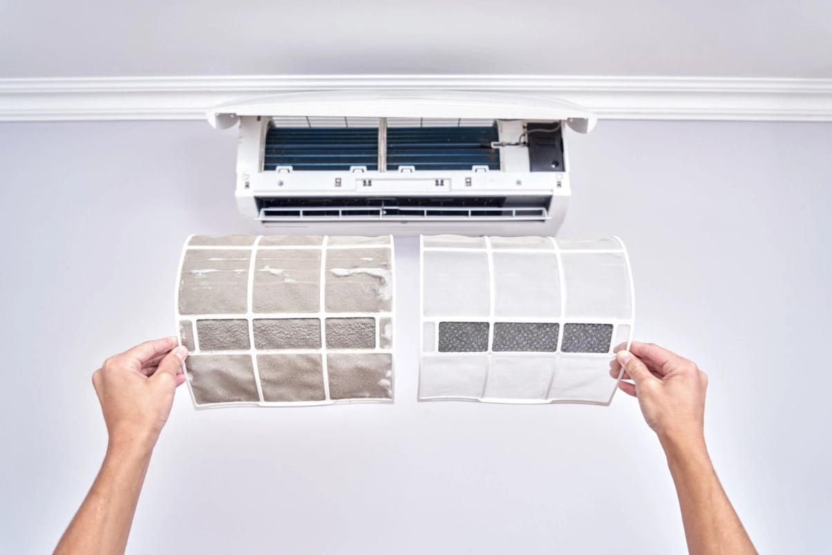 repairmen-are-periodically-repairinsg-cleaning-air-conditioner